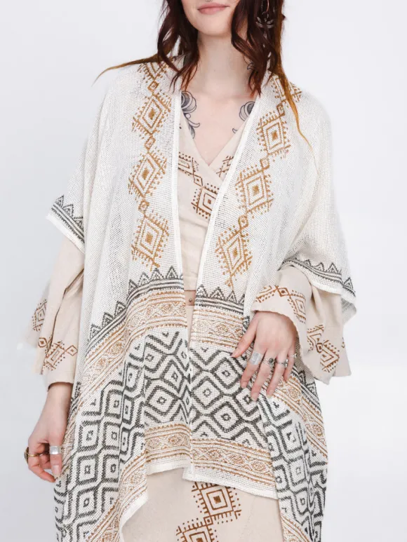 Nomad Chic poncho Gebroken wit